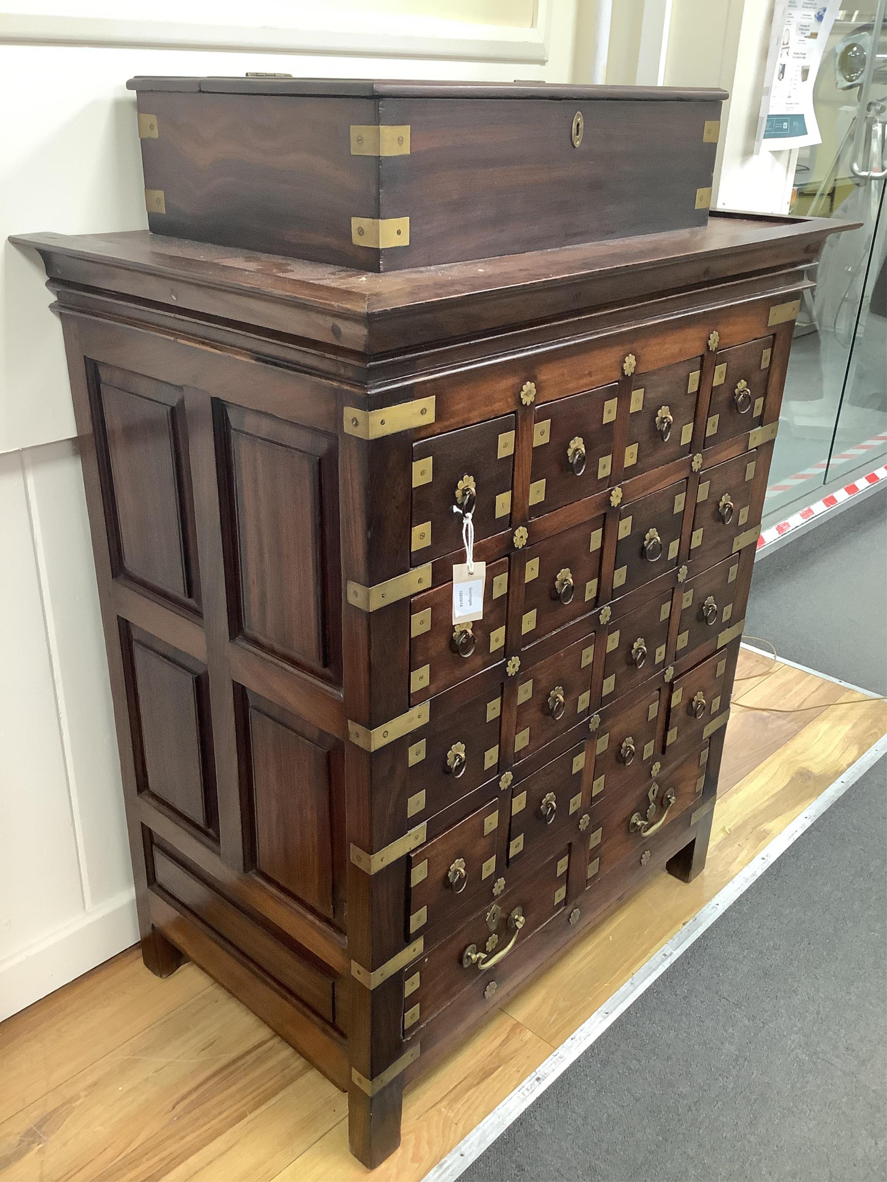 A late 19th century Anglo Indian, Pondicherry, hardwood apothecary chest, eighteen drawers with inner partitions and one attached top chest, width 93cm, depth 56cm, height 126cm. Condition - good